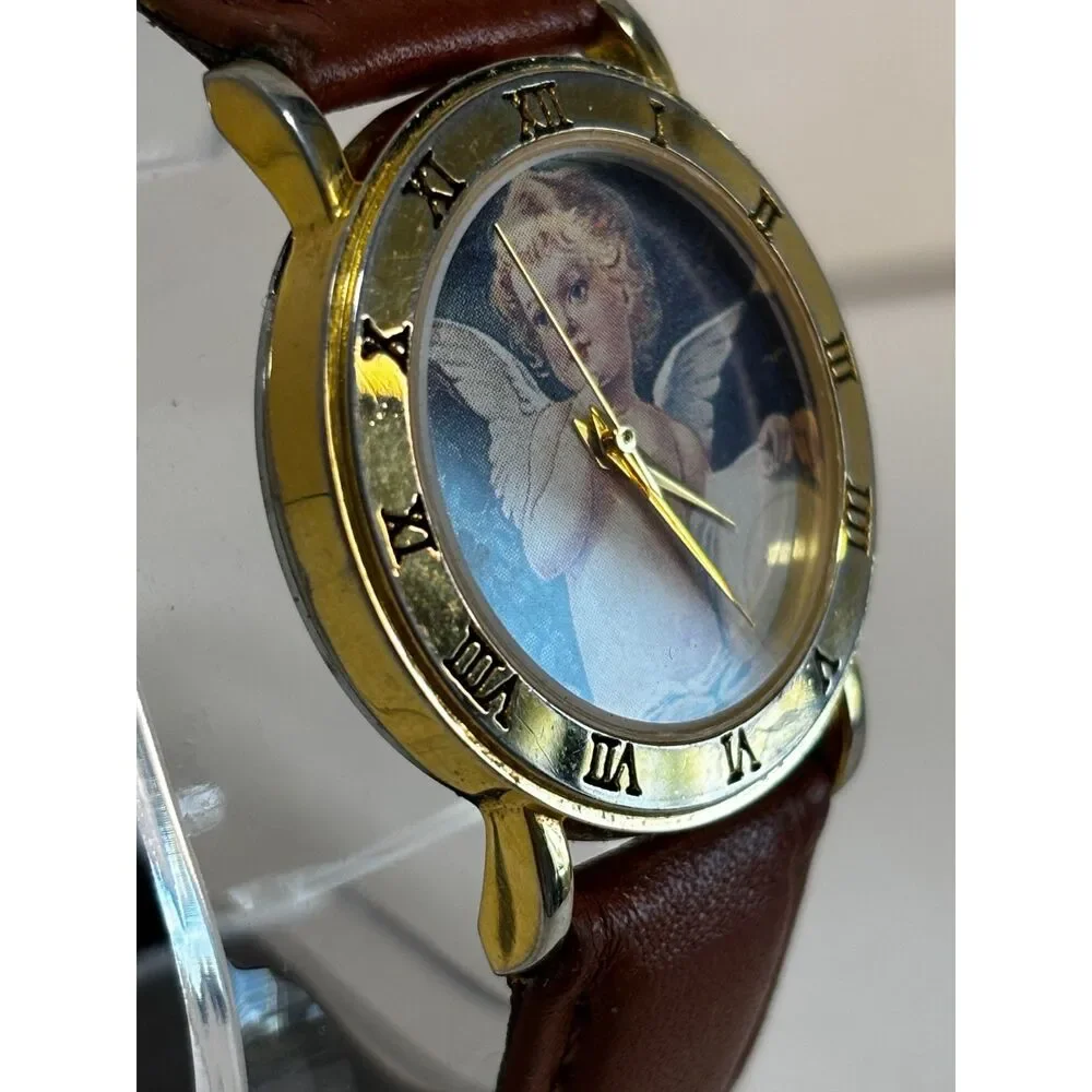 VTG Circa Angels Roman Numeral bezel gold-tone women's watch, working